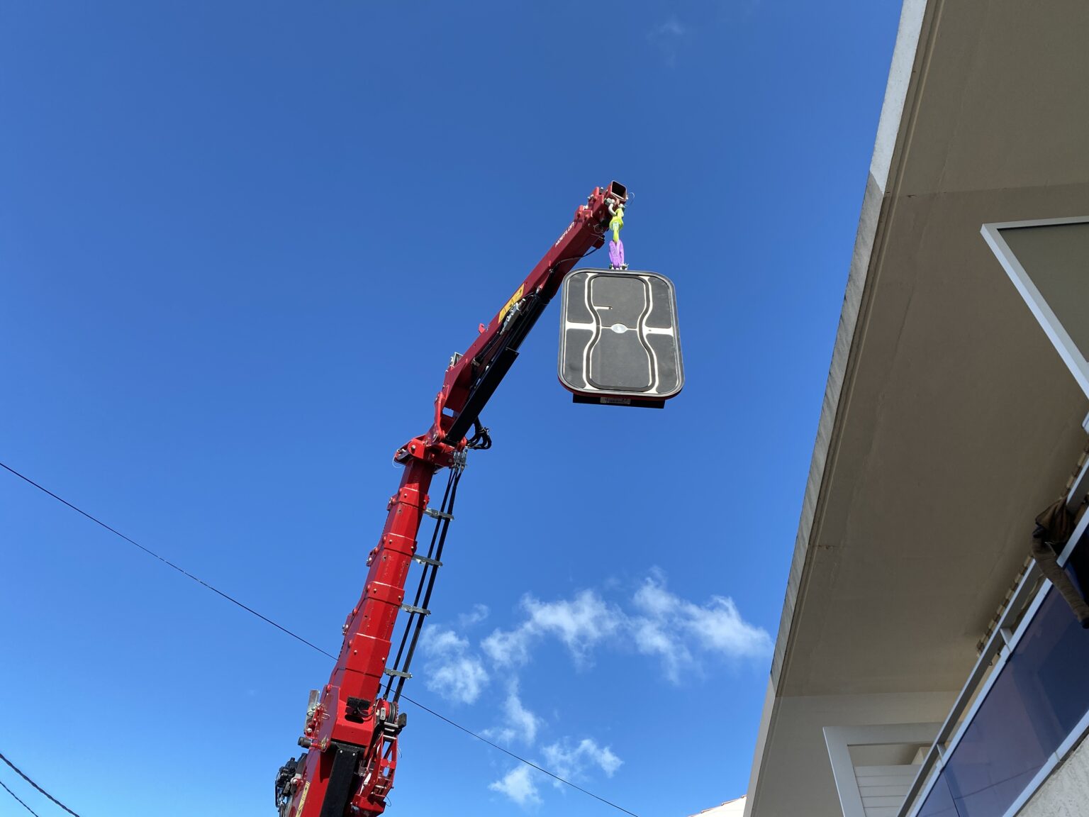 Pourquoi choisir une grue de levage pour vos travaux